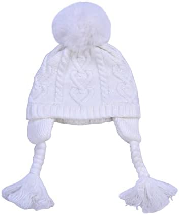 Primeiros passos tricotaram o bonnet de bebê e as meias infantis, botas quentes e gorro com pompom para meninas,